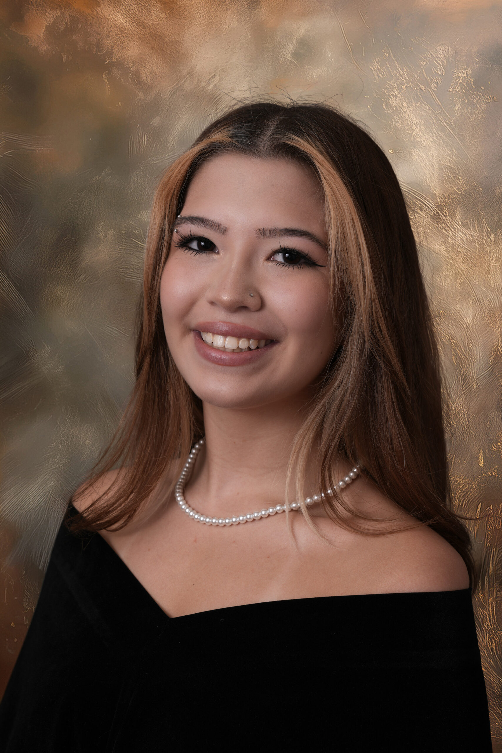 A K12.Photos senior portrait, retouched on a hand-painted studio background.