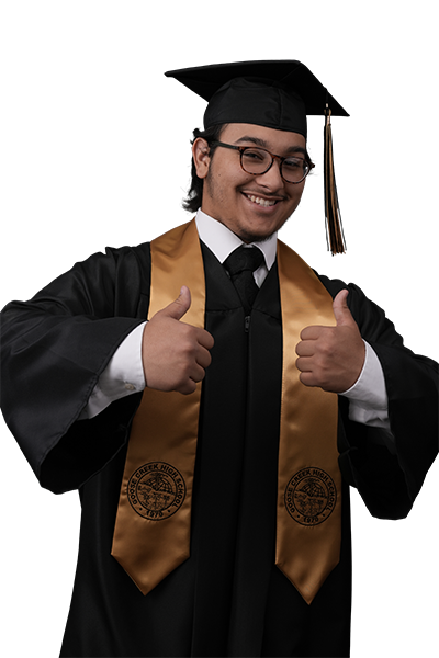 A senior cap-and-gown portrait, shown as shot on the gray screen and again with a new background. Before: as shot.